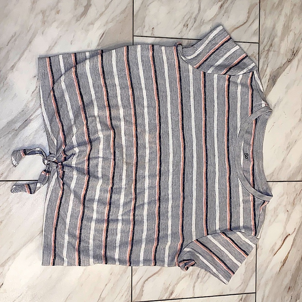 Grey shirt with pink, black, and white stripes